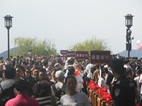 A large number of tourists visit the West Lake in Hangzhou, China, on October 2, 2024. (