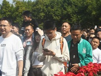 A large number of tourists visit the West Lake in Hangzhou, China, on October 2, 2024. (