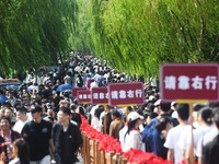 A large number of tourists visit the West Lake in Hangzhou, China, on October 2, 2024. (