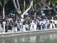 A large number of tourists visit the West Lake in Hangzhou, China, on October 2, 2024. (