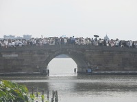 A large number of tourists visit the West Lake in Hangzhou, China, on October 2, 2024. (