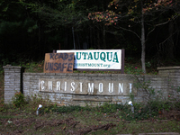 A sign directs drivers on a road in Asheville, North Carolina on October 1, 2024 after Hurricane Helene caused widespread damage to the regi...