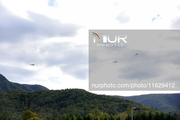 U.S. Navy helicopters survey damage from Hurricane Helene over Asheville, North Carolina on October 1, 2024. 