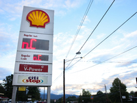 A gas station price sign in Asheville, North Carolina displays the initials of the state on October 1, 2024 after Hurricane Helene caused wi...