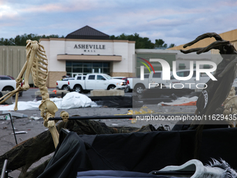 Damaged Halloween products sit in the parking lot of the Asheville Mall in Asheville, North Carolina on October 1, 2024 after Hurricane Hele...