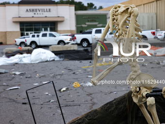 Damaged Halloween products sit in the parking lot of the Asheville Mall in Asheville, North Carolina on October 1, 2024 after Hurricane Hele...