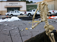 Damaged Halloween products sit in the parking lot of the Asheville Mall in Asheville, North Carolina on October 1, 2024 after Hurricane Hele...