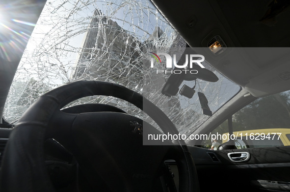 A car windscreen damaged by Russian shelling in Zaporizhzhia, Ukraine, on October 1, 2024. NO USE RUSSIA. NO USE BELARUS. 