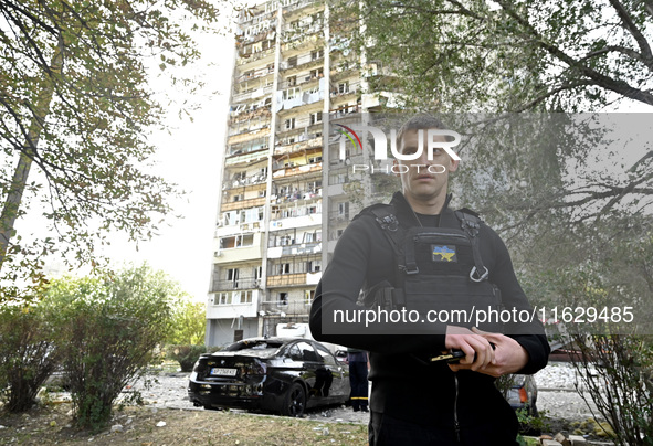 Ivan Fedorov, Head of Zaporizhzhia Regional Military Administration, is seen at the site of Russian shelling of a residential high-rise buil...