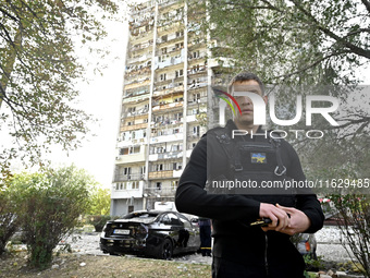 Ivan Fedorov, Head of Zaporizhzhia Regional Military Administration, is seen at the site of Russian shelling of a residential high-rise buil...