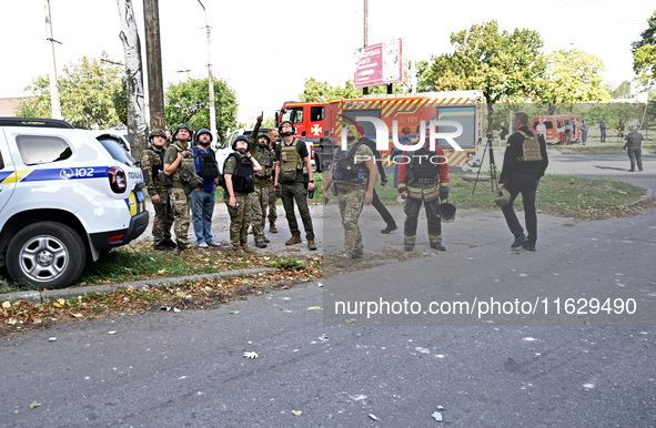 Rescuers arrive at the site of Russian shelling of a residential high-rise building in Zaporizhzhia, Ukraine, on October 1, 2024. NO USE RUS...