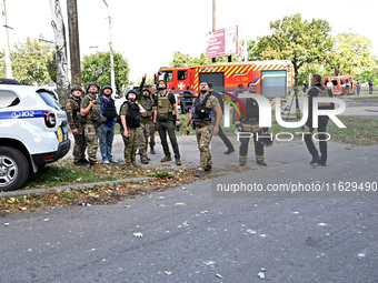 Rescuers arrive at the site of Russian shelling of a residential high-rise building in Zaporizhzhia, Ukraine, on October 1, 2024. NO USE RUS...