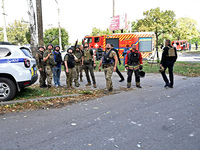 Rescuers arrive at the site of Russian shelling of a residential high-rise building in Zaporizhzhia, Ukraine, on October 1, 2024. NO USE RUS...