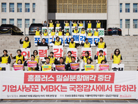 A press conference takes place in front of the National Assembly in Yeouido, Seoul, South Korea, on October 2, 2024, calling for the halt of...