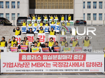 A press conference takes place in front of the National Assembly in Yeouido, Seoul, South Korea, on October 2, 2024, calling for the halt of...