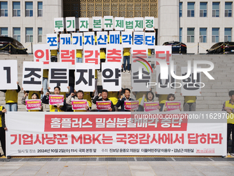 A press conference takes place in front of the National Assembly in Yeouido, Seoul, South Korea, on October 2, 2024, calling for the halt of...