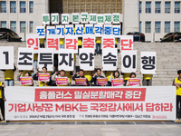 A press conference takes place in front of the National Assembly in Yeouido, Seoul, South Korea, on October 2, 2024, calling for the halt of...