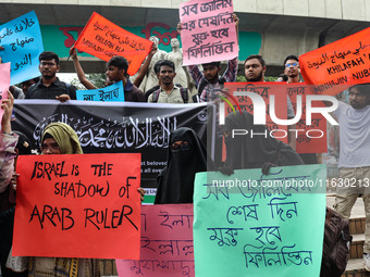 Students of the Faculty of Business Studies of Dhaka University (DU) stage a demonstration and rally against the insult of the Prophet Muham...