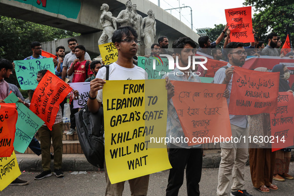 Students of the Faculty of Business Studies of Dhaka University (DU) stage a demonstration and rally against the insult of the Prophet Muham...