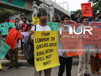 Students of the Faculty of Business Studies of Dhaka University (DU) stage a demonstration and rally against the insult of the Prophet Muham...