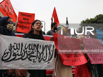 Students of the Faculty of Business Studies of Dhaka University (DU) stage a demonstration and rally against the insult of the Prophet Muham...