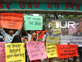 Students of the Faculty of Business Studies of Dhaka University (DU) stage a demonstration and rally against the insult of the Prophet Muham...