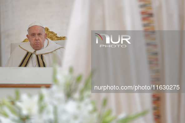 Pope Francis leads the mass for the opening session of the 16th Ordinary General Assembly of the Synod of Bishops in Vatican, on October 2,...