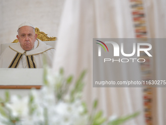 Pope Francis leads the mass for the opening session of the 16th Ordinary General Assembly of the Synod of Bishops in Vatican, on October 2,...