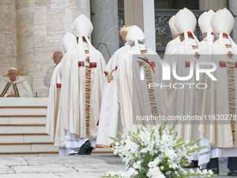 Pope Francis leads the mass for the opening session of the 16th Ordinary General Assembly of the Synod of Bishops in Vatican, on October 2,...