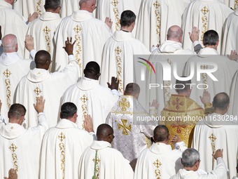 Priests and bishops attend a Holy Mass led by Pope Francis at the opening session of the 16th Ordinary General Assembly of the Synod of Bish...