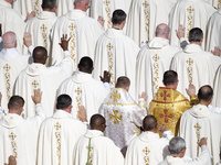 Priests and bishops attend a Holy Mass led by Pope Francis at the opening session of the 16th Ordinary General Assembly of the Synod of Bish...