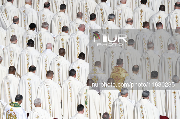 Priests and bishops attend a Holy Mass led by Pope Francis at the opening session of the 16th Ordinary General Assembly of the Synod of Bish...