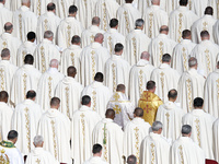 Priests and bishops attend a Holy Mass led by Pope Francis at the opening session of the 16th Ordinary General Assembly of the Synod of Bish...