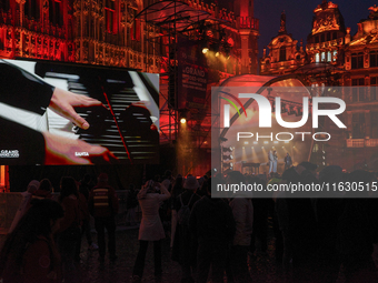 People attend a Wallonie popular music festival in the Grand Place, in Brussels, Belgium, on September 27, 2024. (