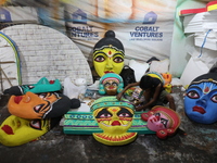 An artisan prepares decoration items to be used for decorating a 'pandal' or temporary platform at a workshop ahead of the Durga Puja festiv...