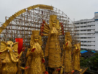 A giant idol of Goddess Durga, towering over 100 ft, is seen at a pandal in Kolkata, India, on October 2, 2024. (