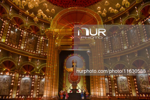 A Durga idol is seen at a decorated pandal commemorating womanhood in Kolkata, India, on October 2, 2024. 