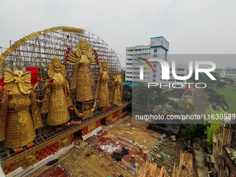 A giant idol of Goddess Durga, towering over 100 ft, is seen at a pandal in Kolkata, India, on October 2, 2024. (