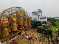 A giant idol of Goddess Durga, towering over 100 ft, is seen at a pandal in Kolkata, India, on October 2, 2024. (