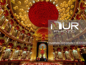 A Durga idol is seen at a decorated pandal commemorating womanhood in Kolkata, India, on October 2, 2024. (