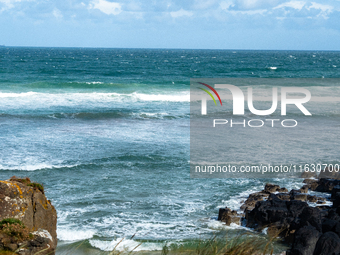 A view of the ocean along the Causeway Coast Area in County Antrim, Northern Ireland, on July 2024. (