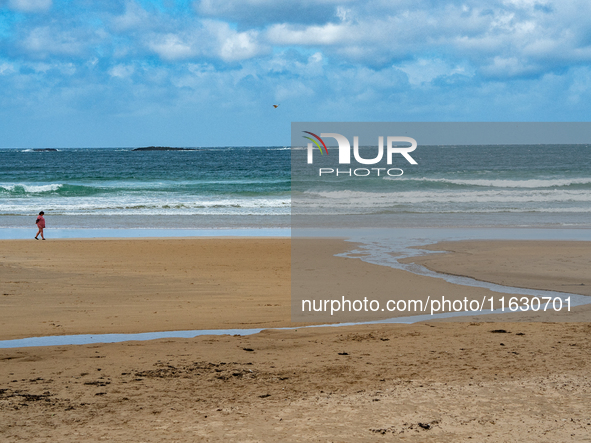 A view of the beach along the Causeway Coast Area in County Antrim, Northern Ireland, on July 2024. 