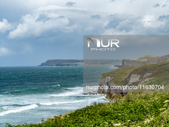 A view of one of the cliffs along the Causeway Coast Area in County Antrim, Northern Ireland, on July 2024. 