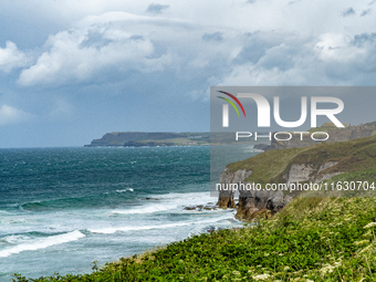 A view of one of the cliffs along the Causeway Coast Area in County Antrim, Northern Ireland, on July 2024. (