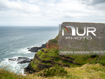 A view of one of the cliffs along the Causeway Coast Area in County Antrim, Northern Ireland, on July 2024. (