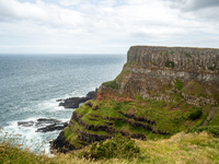 A view of one of the cliffs along the Causeway Coast Area in County Antrim, Northern Ireland, on July 2024. (