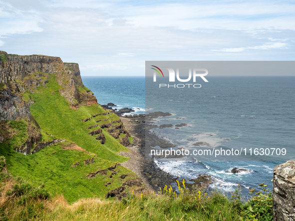 A view of one of the cliffs along the Causeway Coast Area in County Antrim, Northern Ireland, on July 2024. 