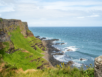 A view of one of the cliffs along the Causeway Coast Area in County Antrim, Northern Ireland, on July 2024. (