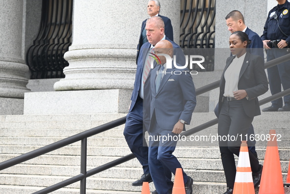 Mayor of New York City Eric Adams departs Thurgood Marshall United States Courthouse following a court appearance on federal charges of brib...