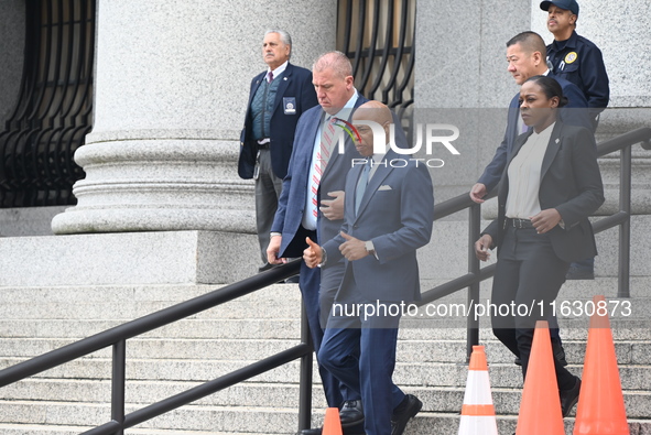 Mayor of New York City Eric Adams departs Thurgood Marshall United States Courthouse following a court appearance on federal charges of brib...